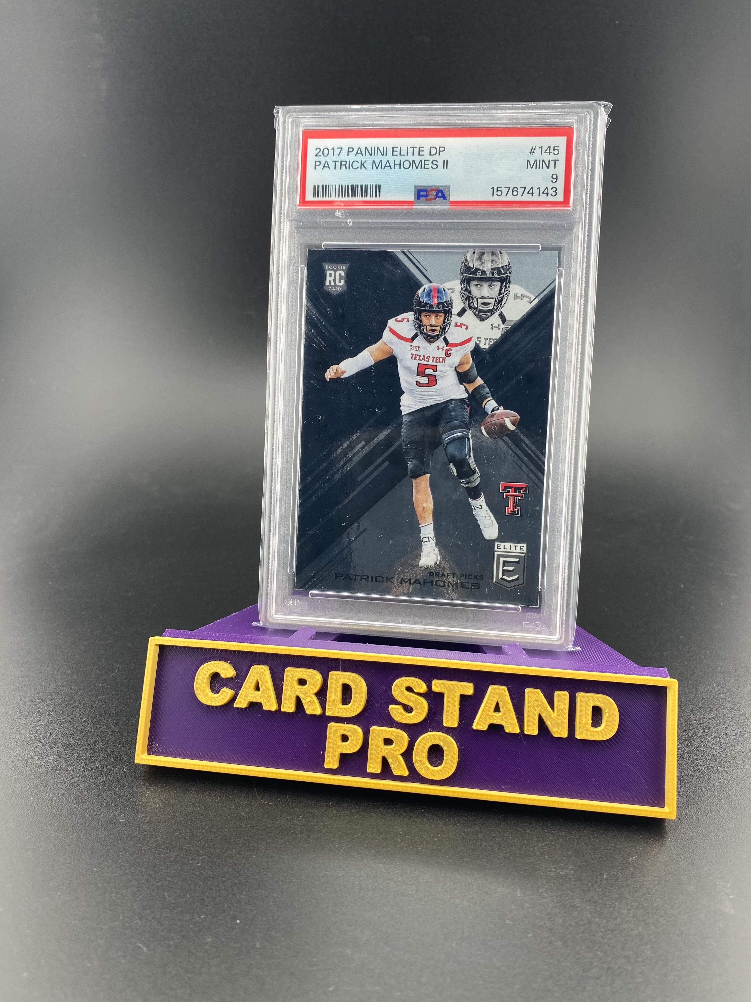 A graded football card displayed in a purple and gold Card Stand Pro